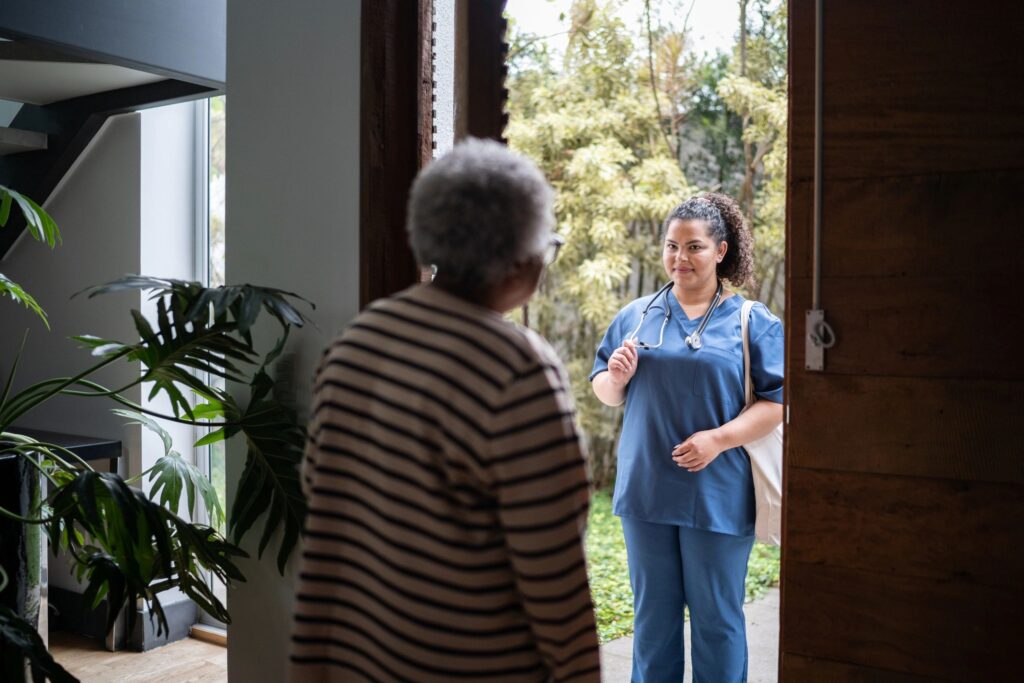 Healthcare worker arriving at patient's house
